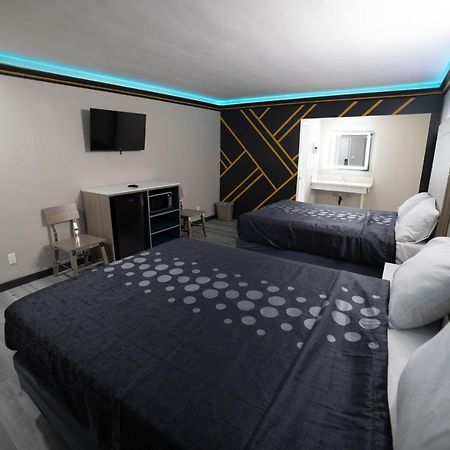 Artesia Motor Inn Беллфлауэр Экстерьер фото