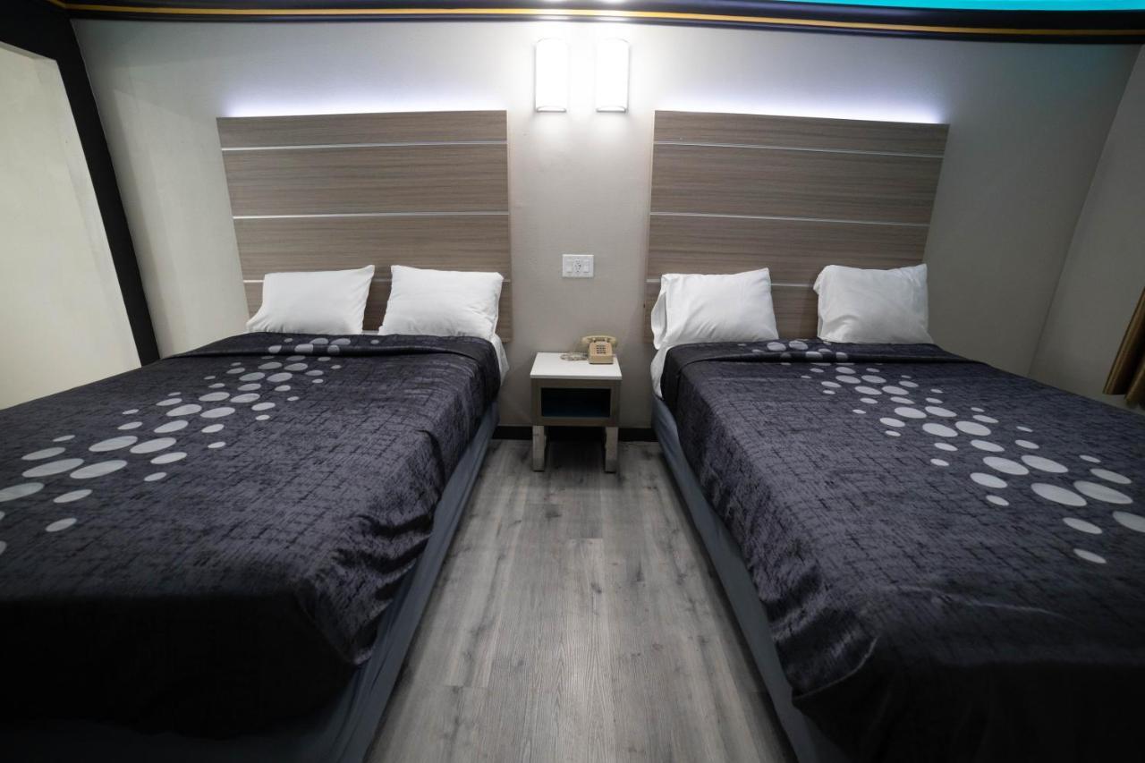 Artesia Motor Inn Беллфлауэр Экстерьер фото
